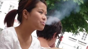 Cute Asian Enjoys Smoking