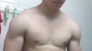 Fit korean shows his armpits and biceps, wanks and cums