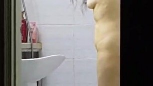 Asian Milf Geumja takes a shower