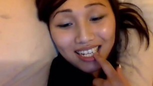 Cute Asian Ladyboy playing with her dick and with a sex toy