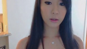 Sexy Asian Babe Striptease and Flashes her Pussy